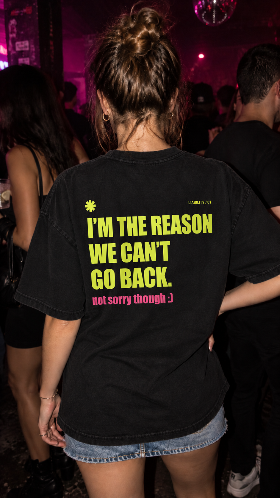 DEMASI LIABILITY back print photographed at a party
